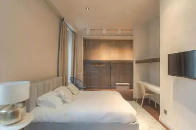 Un ou plusieurs lits dans un hébergement de l'établissement Appartement spacieux et lumineux pour 8, Lyon 1er