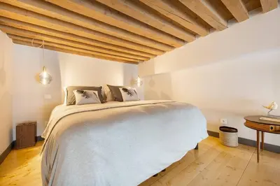 Un ou plusieurs lits dans un hébergement de l'établissement Concerto Royal Duplex Top Centre, Lyon 1er