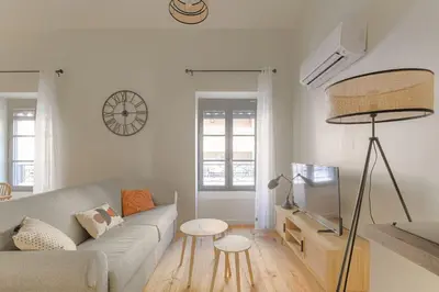 Coin salon dans l'établissement T3 neuf, climatisé proche Lyon 3