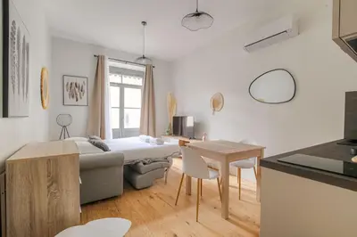 Un ou plusieurs lits dans un hébergement de l'établissement Appartement T2 neuf, climatisé proche Lyon 3