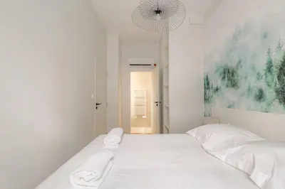 Un ou plusieurs lits dans un hébergement de l'établissement Appartement T2 neuf, climatisé proche Lyon 3