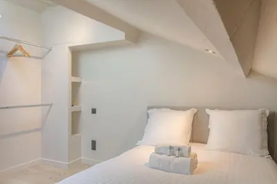 Un ou plusieurs lits dans un hébergement de l'établissement T3 spacieux en duplex, 2 chambres, Villeurbanne