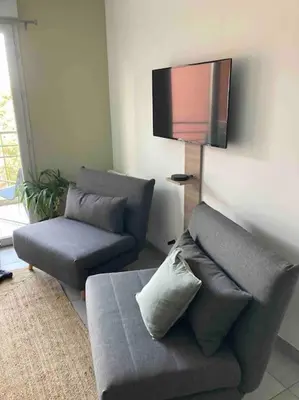 Coin salon dans l'établissement Un balcon à Monplaisir- 4 lits -garage - 47m2
