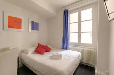 Un ou plusieurs lits dans un hébergement de l'établissement Studio fonctionnel et rénové, Berges du Rhône