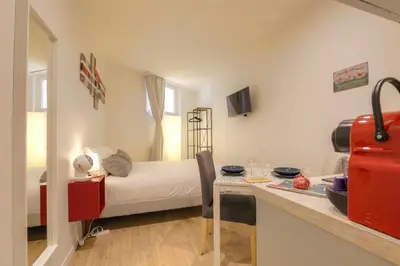 Un ou plusieurs lits dans un hébergement de l'établissement Appartement avec terrasse - Proche Berges du Rhône