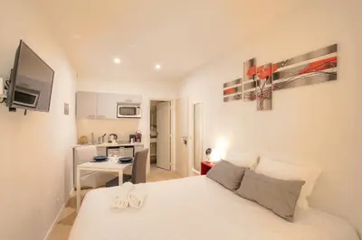 Un ou plusieurs lits dans un hébergement de l'établissement Appartement avec terrasse - Proche Berges du Rhône