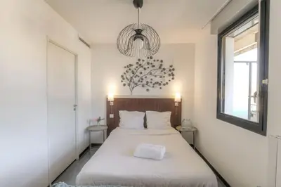 Un ou plusieurs lits dans un hébergement de l'établissement Bel appartement avec vue imprenable, Lyon-Vaise