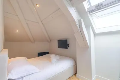 Un ou plusieurs lits dans un hébergement de l'établissement Bel appartement T3, bien équipé, Ecully