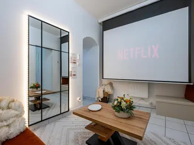 Télévision ou salle de divertissement dans l'établissement La Petite Vienna - Vienna authentica