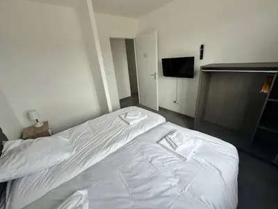 Un ou plusieurs lits dans un hébergement de l'établissement House 60 with 3 bedrooms lechaffardcom