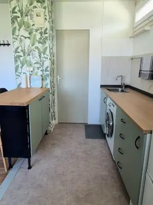 Cuisine ou kitchenette dans l'établissement Studio privé