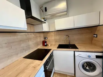Cuisine ou kitchenette dans l'établissement T2 rénové à 15 min de Lyon