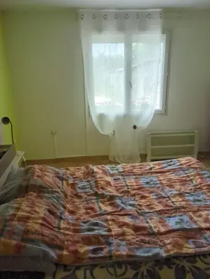 Un ou plusieurs lits dans un hébergement de l'établissement chambre calme proximité aéroport