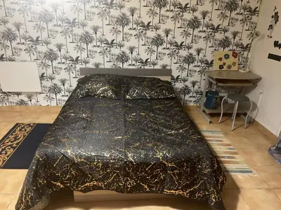 Un ou plusieurs lits dans un hébergement de l'établissement chambre calme proximité aéroport