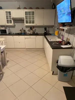 Cuisine ou kitchenette dans l'établissement chambre calme proximité aéroport