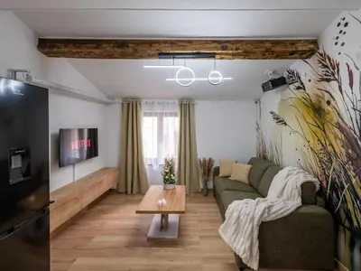 Télévision ou salle de divertissement dans l'établissement La petite Rosée - Vienna authentica