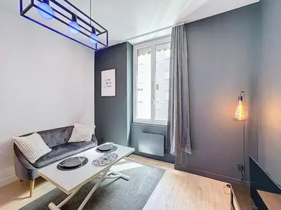 Un ou plusieurs lits dans un hébergement de l'établissement My home jean claude vivant 1