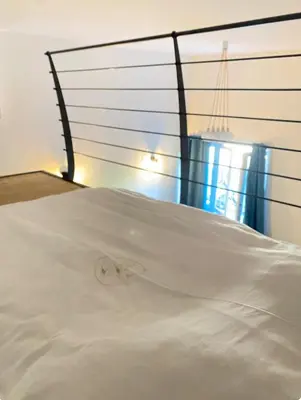 Un ou plusieurs lits dans un hébergement de l'établissement Beautiful Mezzanine Studio- City Center Lyon