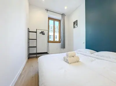 Un ou plusieurs lits dans un hébergement de l'établissement My home Lafayette 4