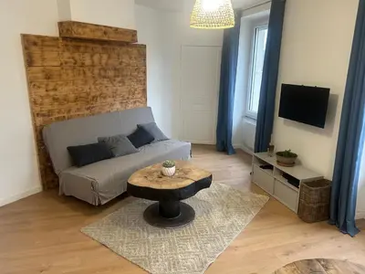 Télévision ou salle de divertissement dans l'établissement Victor Hugo