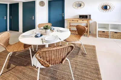 Coin salon dans l'établissement Villa Eurexpo 185m2