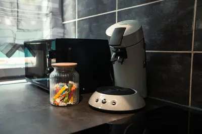 Cuisine ou kitchenette dans l'établissement Le refuge - T2 Proximité LDLC Groupama Stadium