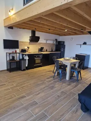 Cuisine ou kitchenette dans l'établissement La Forge