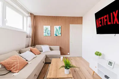 Télévision ou salle de divertissement dans l'établissement Appartement 