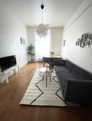 Télévision ou salle de divertissement dans l'établissement Appartement Brunard