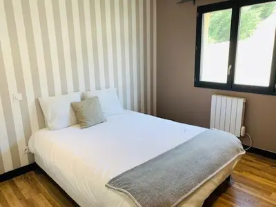 Un ou plusieurs lits dans un hébergement de l'établissement Belle villa proche de Lyon dans le Beaujolais