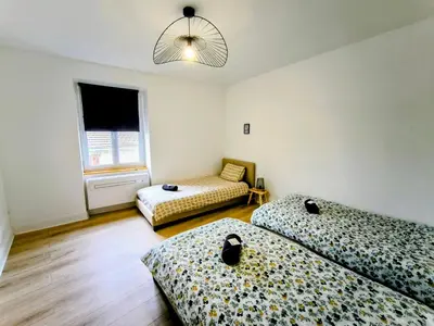Un ou plusieurs lits dans un hébergement de l'établissement Chez Lulu - 5 lits- proche CNPE - Gare