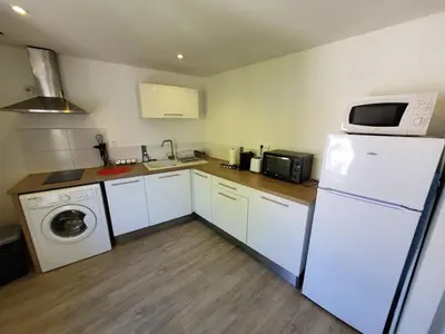 Cuisine ou kitchenette dans l'établissement Le Donjon - Lyon-Groupama stadium LDLC arena Eurexpo