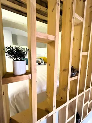 Un ou plusieurs lits dans un hébergement de l'établissement Appartement Canut Lyon Croix-Rousse
