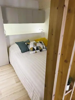 Un ou plusieurs lits dans un hébergement de l'établissement Appartement Canut Lyon Croix-Rousse