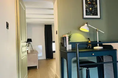Un ou plusieurs lits dans un hébergement de l'établissement Appart dans villa EUREXPO LDLC ARENA GROUPAMA STADIUM