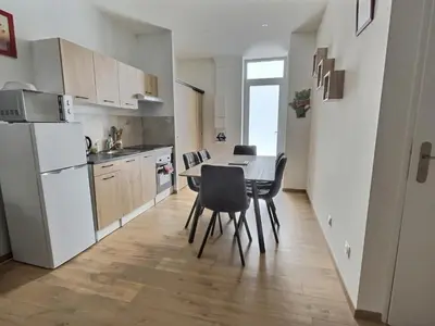 Cuisine ou kitchenette dans l'établissement Appartement Zen & Cosy