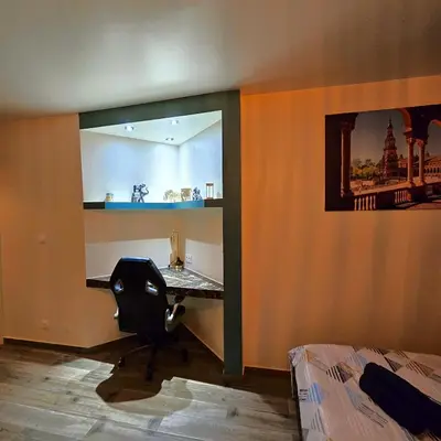 Un ou plusieurs lits dans un hébergement de l'établissement Studio cosy confort moderne