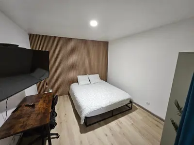 Télévision ou salle de divertissement dans l'établissement Appartement Type 1 avec parking
