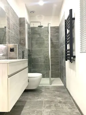 Salle de bains dans l'établissement Maison de village avec extérieur