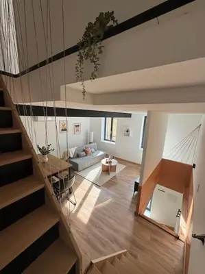 Un ou plusieurs lits dans un hébergement de l'établissement Spacieuse et Elégante Maison de ville