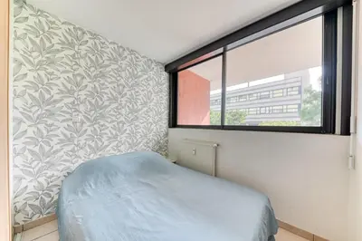 Un ou plusieurs lits dans un hébergement de l'établissement Apartment - 4P - Villeurbanne