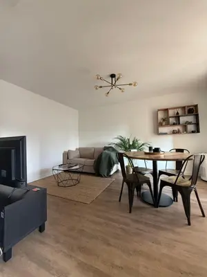 Télévision ou salle de divertissement dans l'établissement Appartement spacieux