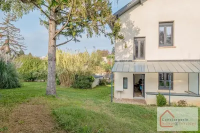 Jardin de l'établissement Confort Nature - Maisonnette avec Jardin, Garage, Proche Eurexpo