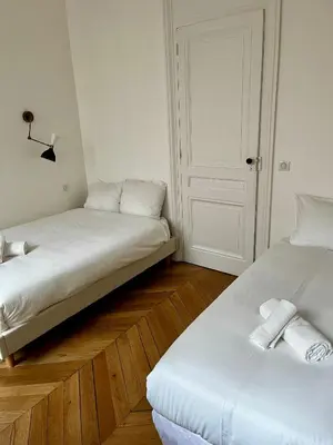 Un ou plusieurs lits dans un hébergement de l'établissement Appartement au coeur de la presqu'ile