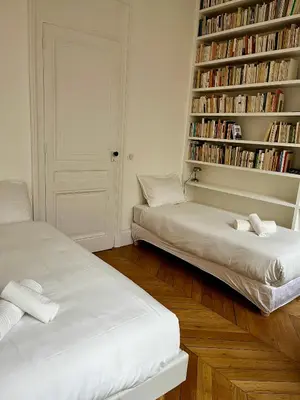 Un ou plusieurs lits dans un hébergement de l'établissement Appartement au coeur de la presqu'ile