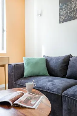 Coin salon dans l'établissement Beige Hospitalité - Agathe - Le nid Urbain