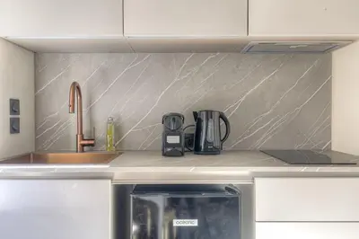 Cuisine ou kitchenette dans l'établissement Studio calme et bien équipé, Saint-Didier
