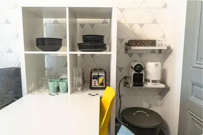 Cuisine ou kitchenette dans l'établissement Lafayette, Charmant