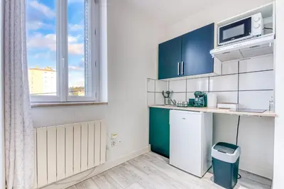 Cuisine ou kitchenette dans l'établissement Studio Le Rayon NEUF & Cosy - Gare Parilly