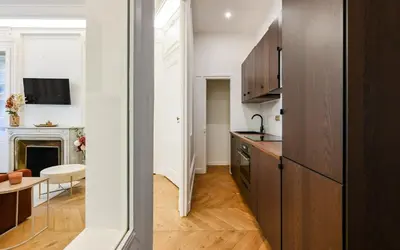 Cuisine ou kitchenette dans l'établissement Appart Élégance